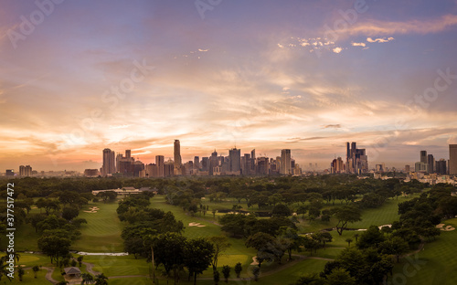 Panorama Aerial Drone Picture of the Skyline of Makati in Metro Manila, Philippines during Sunset photo