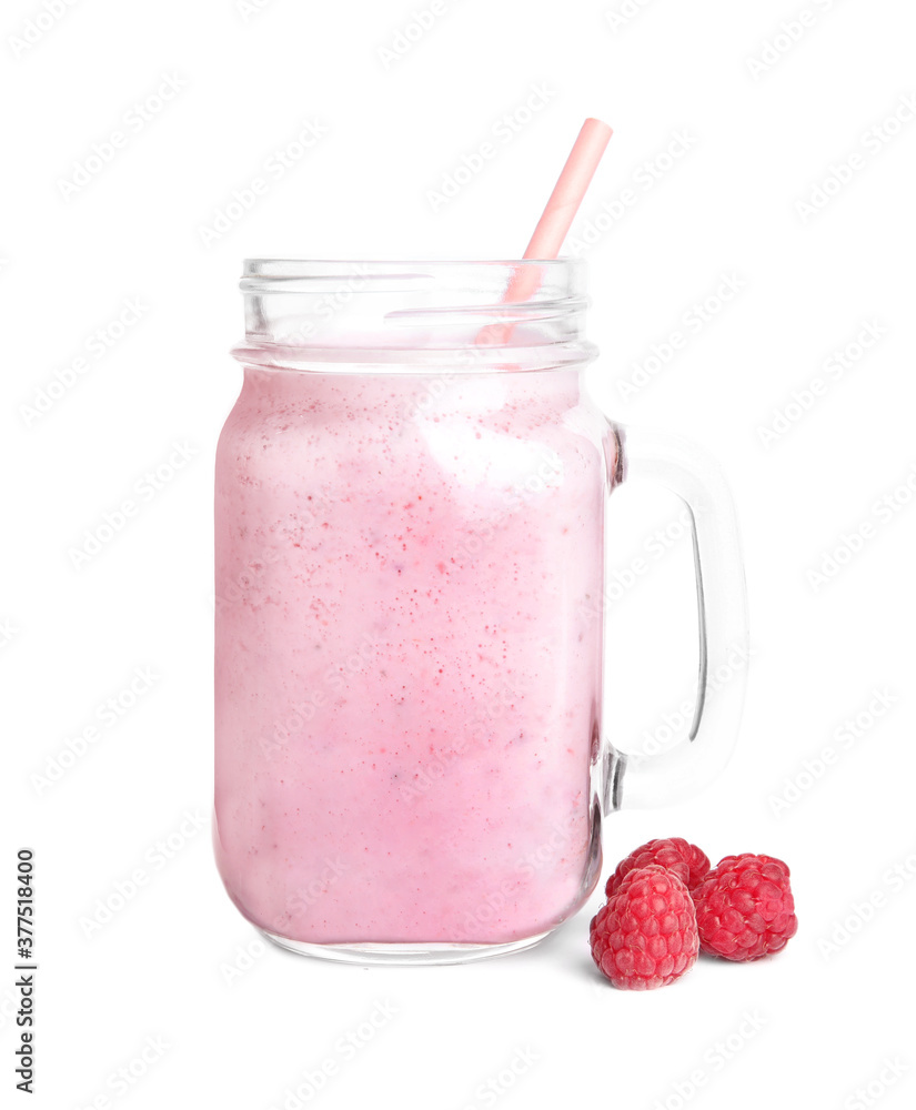 Tasty raspberry milk shake in mason jar and fresh berries isolated on white Tasty raspberry milk shake in mason jar and fresh berries isolated on white