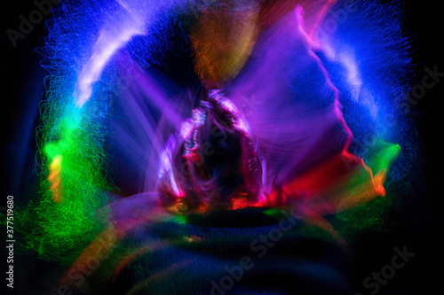 light fantasies, fuzzy, beautiful and colorful light paintings, abstract light lines and blurred facial contours, light textures photo