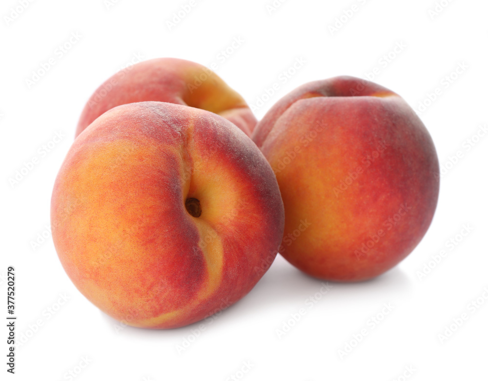 Delicious ripe juicy peaches isolated on white Delicious ripe juicy peaches isolated on white