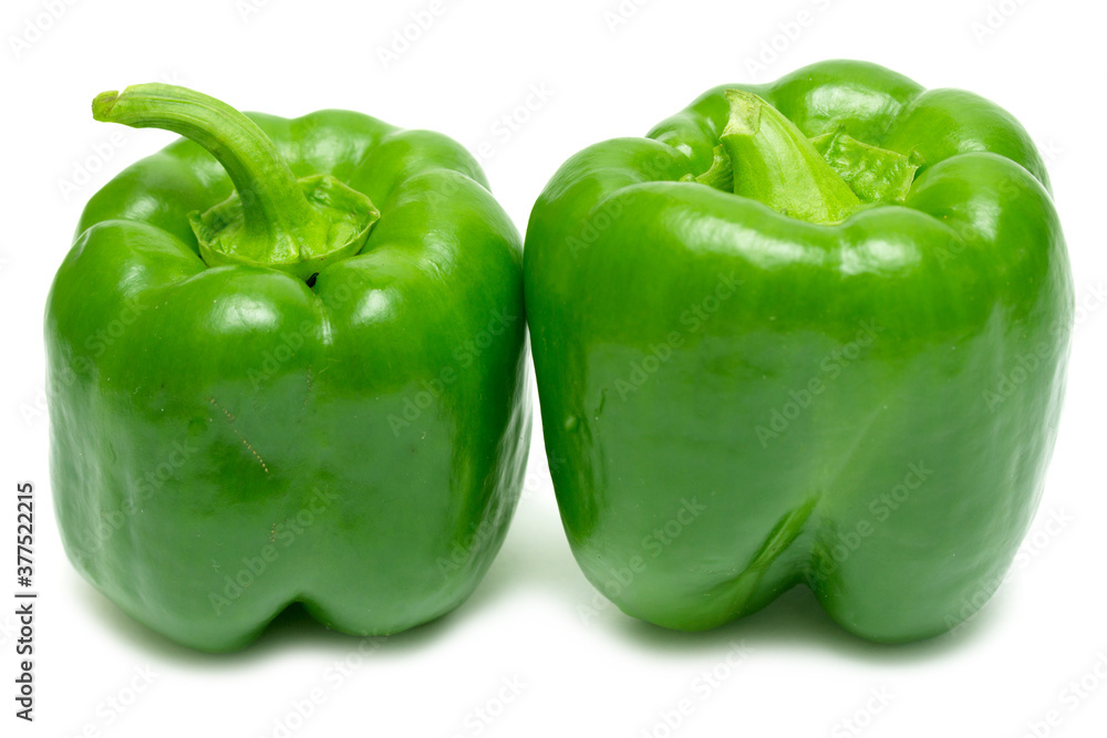 Green bell peppers on a white background Green bell peppers on a white background
