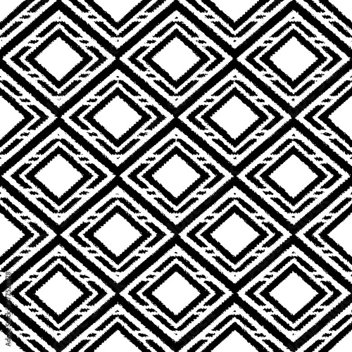 Vector ikat seamless pattern. Geometric boho pattern. Black and white ethnic texture. Tribal background. Navajo motif. Abstract folk design for pillow, rug, textile, pillowcase, wallpapers, prints 