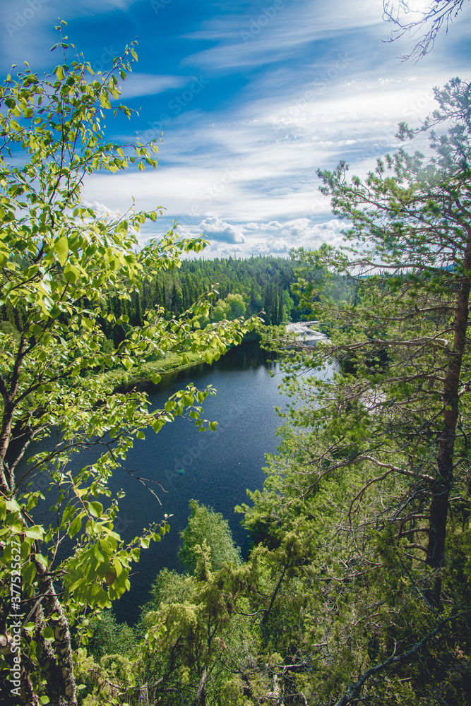 Fototapeta premium hiking path near a lake in finland