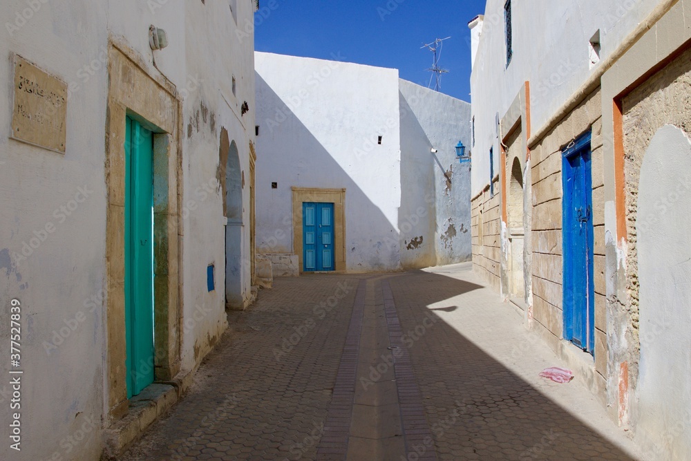 narrow street in the old town of Kairouan, Tunisia