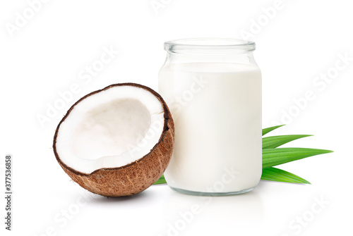 Coconut milk with cut in half isolated on a white background