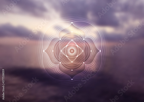 Vector background, template of banner, poster, cover and etc. for yoga, meditation and relax. Spiritual sacred geometry mandala on blurred backdrop with sea sunrise.