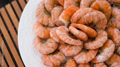 Tiger prawns on a large whi...