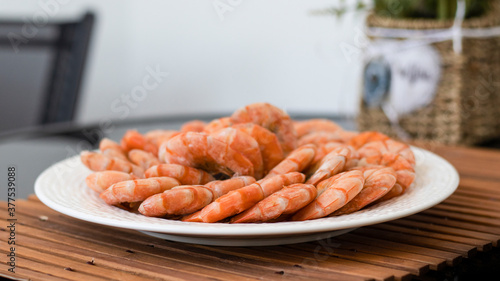 Tiger prawns on a large whi...