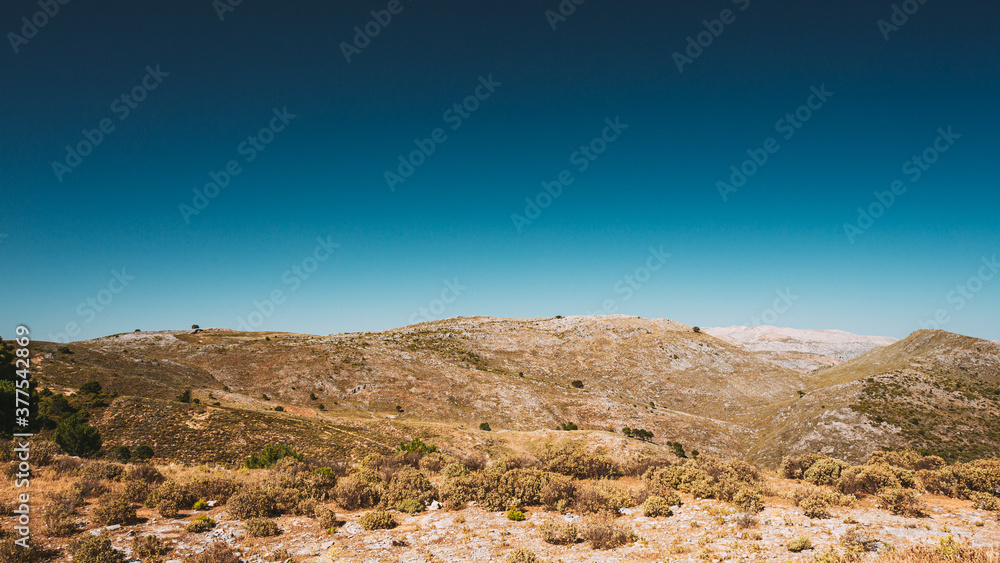 Andalusia, Spain. View Of Mountains Landscape in Summer Sunny Day With Clear Blue Sky.
