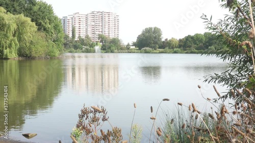 View over the Schiller Pond in the center of Wolfsburg to the high-rise building at Muehlengraben