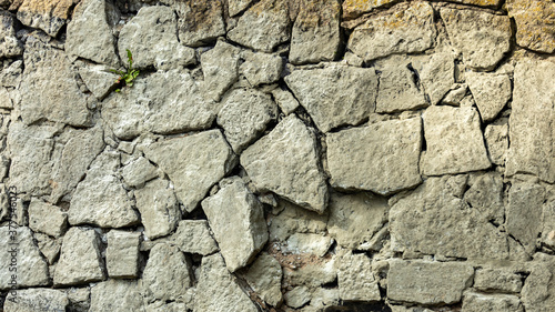 the crumbling grey stone wall of the castle,backgrounds, textures