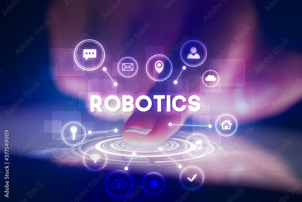 Finger touching tablet with web technology icons and ROBOTICS inscription, web technology concept Finger touching tablet with web technology icons and ROBOTICS inscription, web technology concept