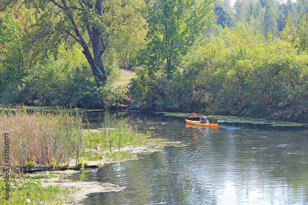 a canoe trip  on the autumn river