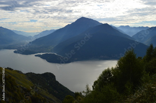 Reflections of the mountains around Lake Como in Lombardy, Northern Italy © ChrisOvergaard