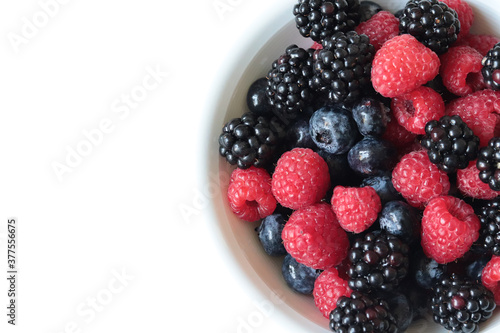 blueberries  raspberries and blackberries in a bowl