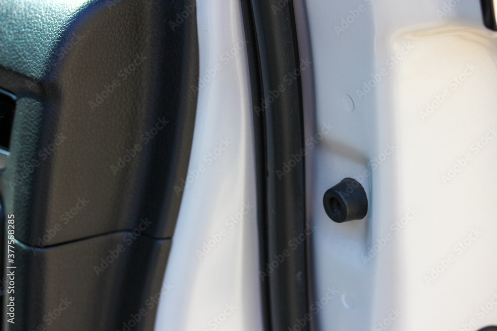 close up of a car door rubber seal and stopper close up of a car door rubber seal and stopper