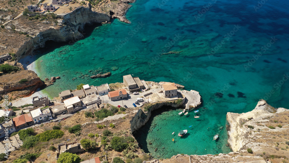 Aerial drone photo of beautiful fishing seaside village of Mezapos with crystal clear emerald beach in Mani Peninsula, Lakonia prefecture, Peloponnese, Greece