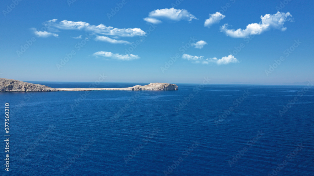 Aerial drone photo of old ruins of fortified Medieval castle in cape of Mezapos called Aerial drone photo of old ruins of fortified Medieval castle in cape of Mezapos called