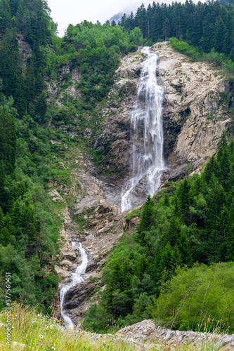 Mischbach waterfall (160m) in Tirol, Austria. photo