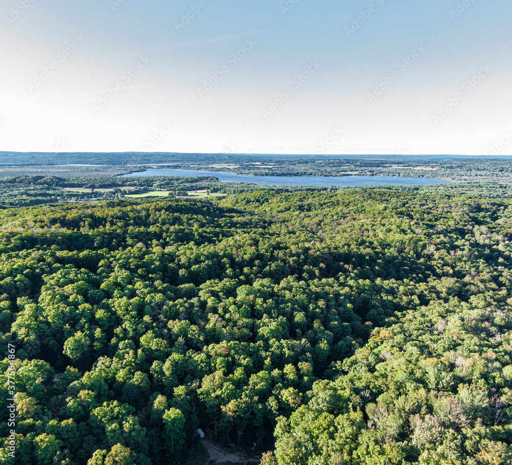Obraz premium Aerial view of Pickerel Lake from the hills of Northern Michigan