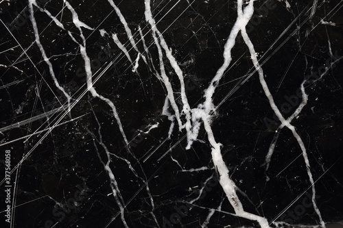 White pattern natural of black marble texture background.