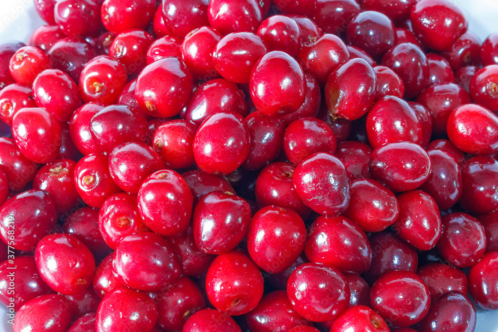Red cherries close up background texture Red cherries close up background texture