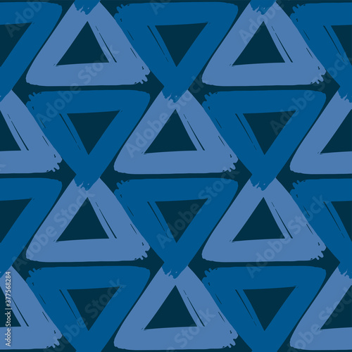 Blue ink triangles isolated on dark background. Geometric seamless pattern. Vector flat graphic hand drawn illustration. Texture.