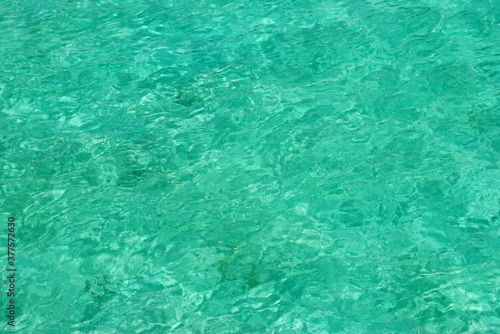 Sea watercolor near to the beach of the tropical island