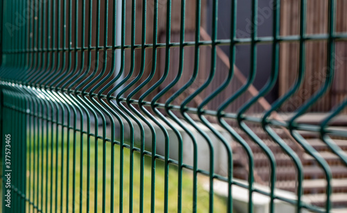 Metal fence made of steel wire to protect and limit the area.