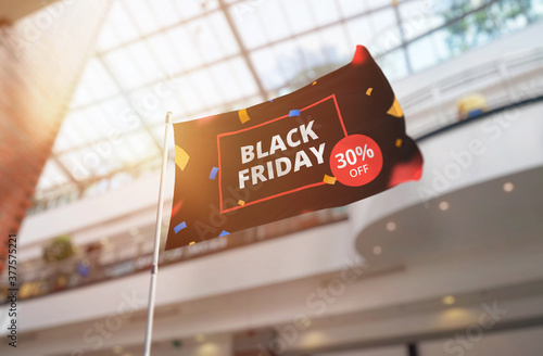 Black friday sale banner in shopping mall. Holiday sale concept photo