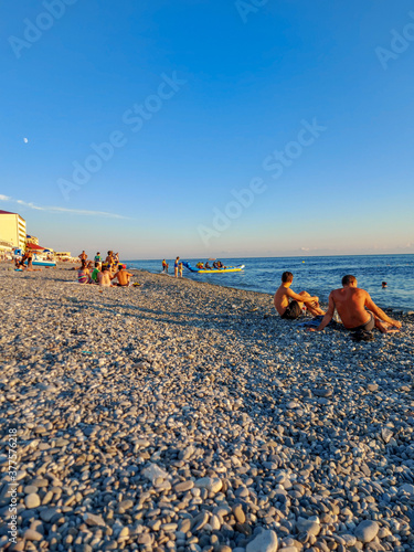 Amazing sunrise over a tropical beach in Sochi.