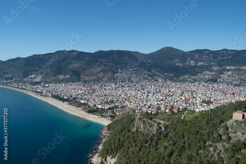 Beautiful aerial view of spectacular city of Alania with mountains view in the distance