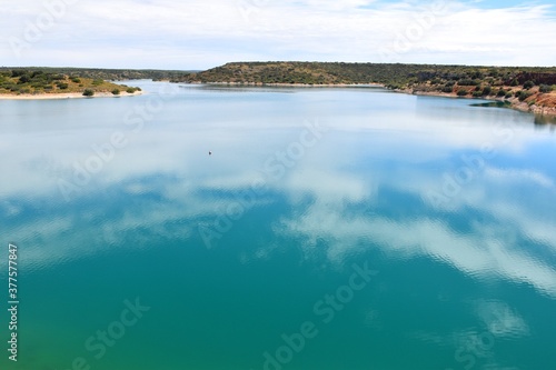 Blue waters of the Peñarroya reservoir, Ruidera lagoons.