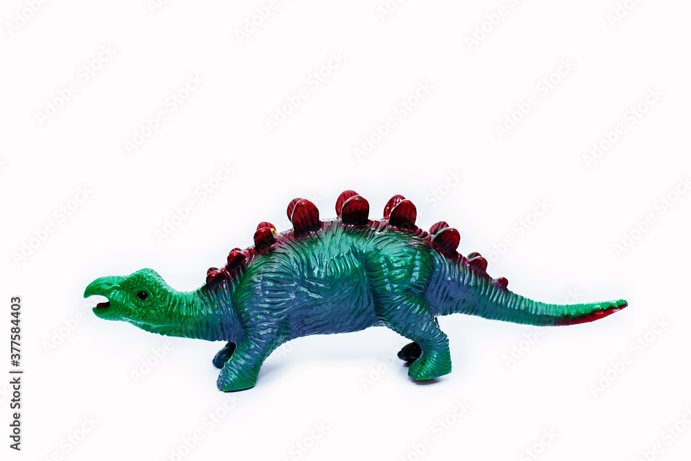 Fototapeta premium toy for children - dinosaur on a white background, isolated