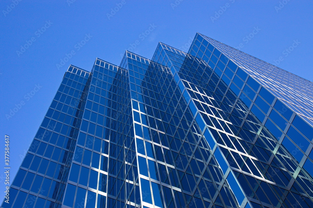 A building facade resembling a staircase leading into the sky. A building facade resembling a staircase leading into the sky.
