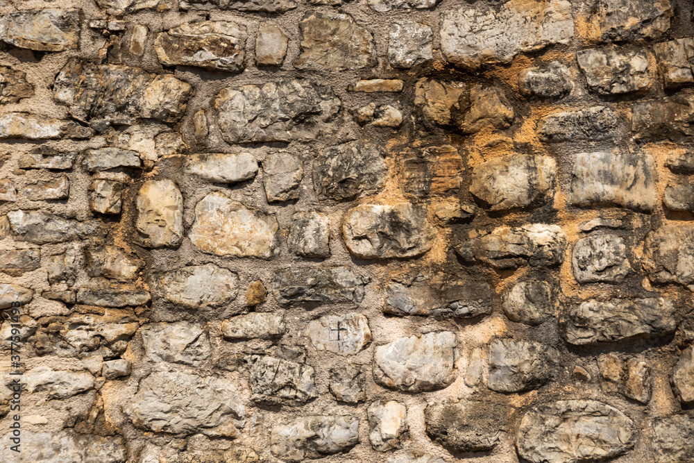Stone texture from the old town of montenegro, budva, venetian era Stone texture from the old town of montenegro, budva, venetian era