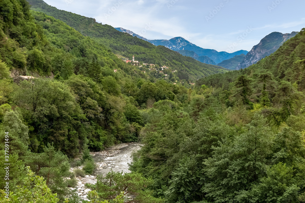Beautiful landscape of the Tineé River Valley, with lots of vegetation and mountains, Provence-Alpes-Côte d'Azur region, Alpes de Haute Provence, France