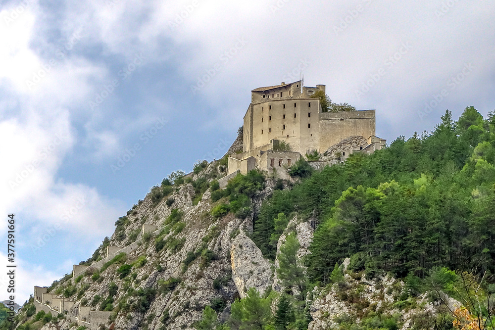 Main building, on top of the mountain, of the fortress of the French medieval city of Entrevaux, Provence-Alpes-Côte d'Azur region, Alpes de Haute Provence, France