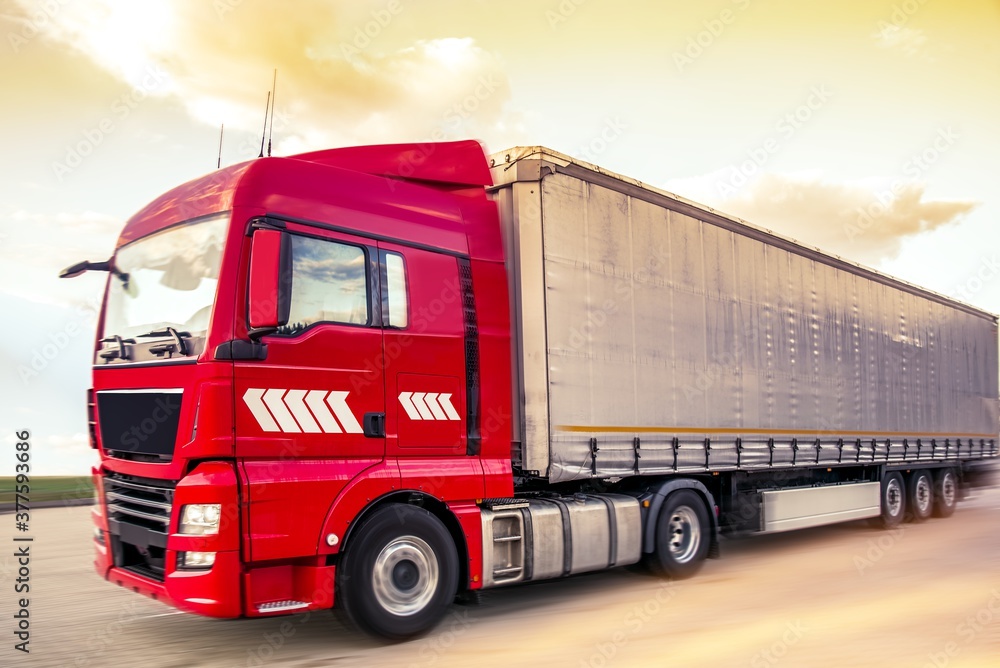 Motion blurred trucks on highway. Transportation Motion blurred trucks on highway. Transportation