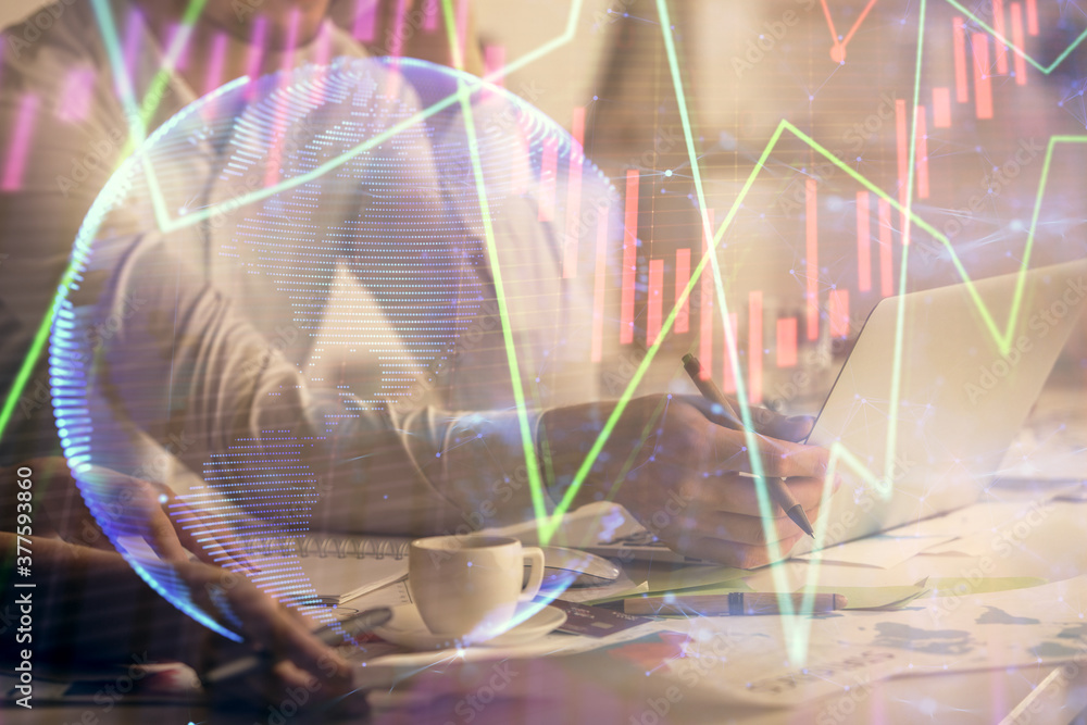 Multi exposure of man and woman working together and financial chart hologram. Business concept. Computer background. Multi exposure of man and woman working together and financial chart hologram. Business concept. Computer background.