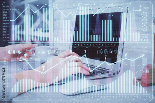 Double exposure of woman hands typing on computer and forex chart hologram drawing. Stock market analysis concept. © peshkova