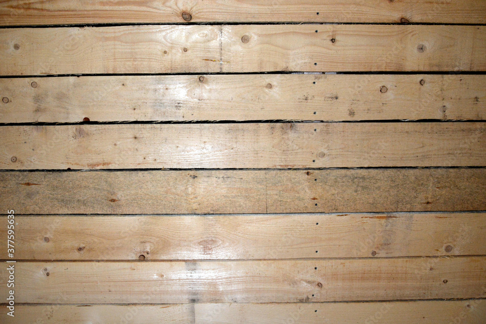 Fototapeta premium Texture of a wooden wall. Ceiling and wall boards.