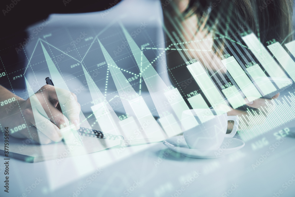 Double exposure of forex graph sketch hologram and woman holding and using a mobile device. Stock market concept. Double exposure of forex graph sketch hologram and woman holding and using a mobile device. Stock market concept.