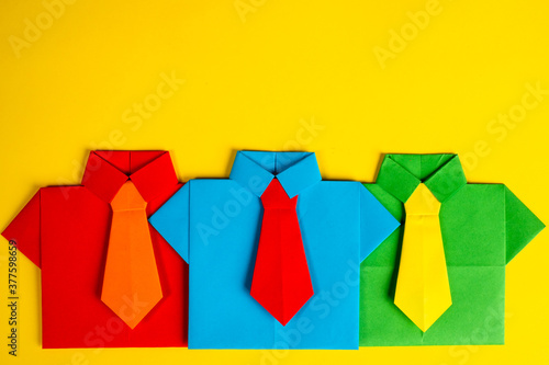 Colorful origami men symbol...