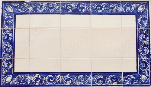 blue tile plaque in wall, street of Portugal