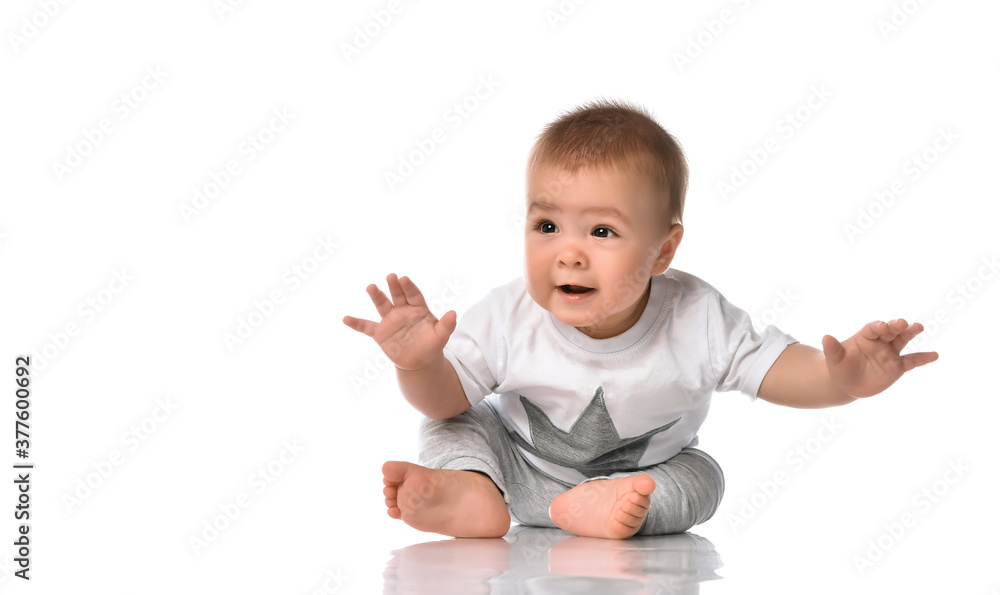 Joyful cheery little baby isolated over white background Joyful cheery little baby isolated over white background