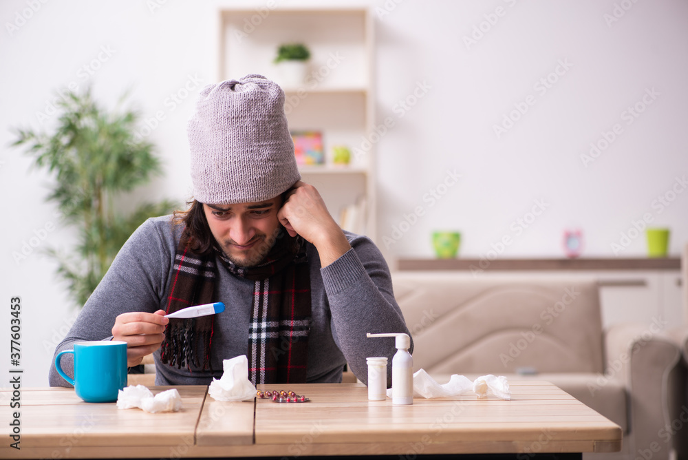 Young man suffering at home Young man suffering at home