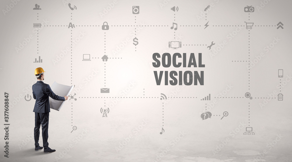 Engineer working on a new social media platform with SOCIAL VISION inscription concept Engineer working on a new social media platform with SOCIAL VISION inscription concept