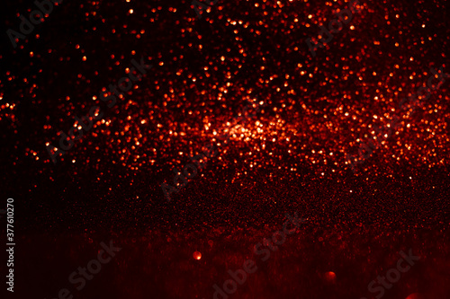 Abstract red sparkling bokeh background. Top horizontal view copyspace.