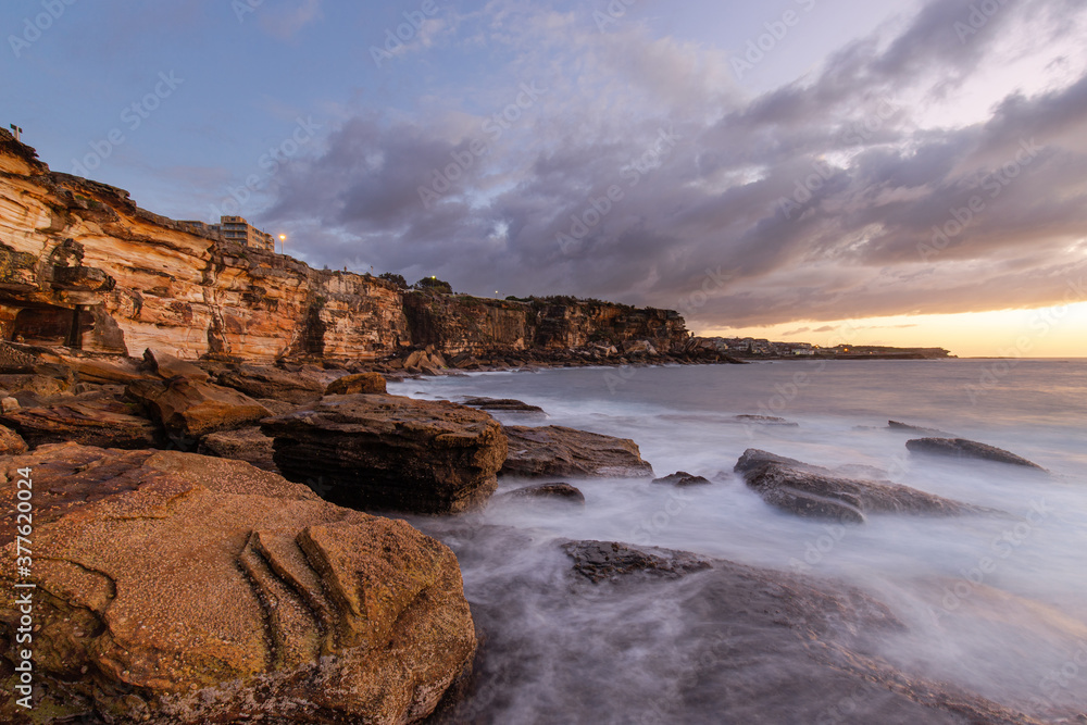 Coogee rock cliff view during sunrise.